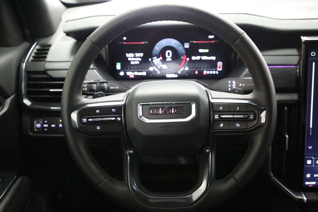 2024 GMC Acadia — rear three-quarter view