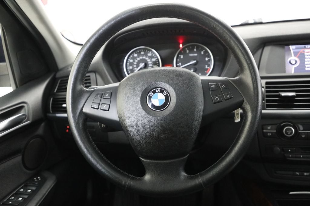 2012 BMW X5 — rear three-quarter view